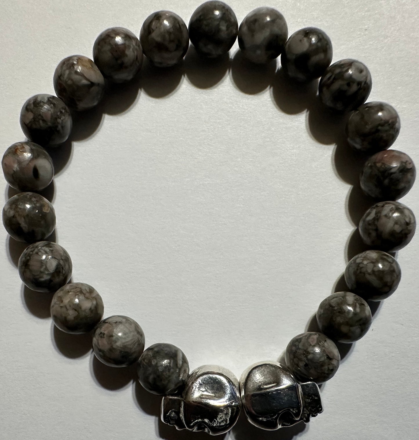 Llinate and Silver Color Skull Gemstone Bracelet